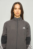 Cortaviento casual  gris  adidas talla L 700