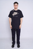 Polera Print negro the nike tee Talla L 4