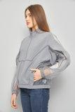 Cortaviento casual  gris reebok gb talla L 309